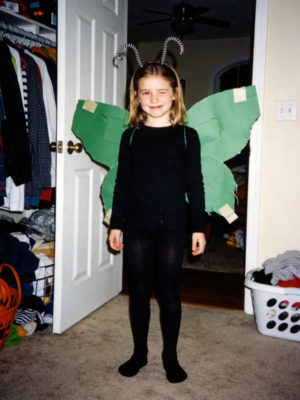 Real photo: green paper butterfly wings and black clothes